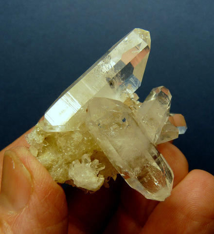 Harlequin quartz group with unique dome shaped gas inclusion