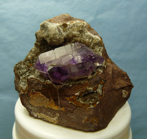 Amethyst quartz crystal group with calcite, on matrix