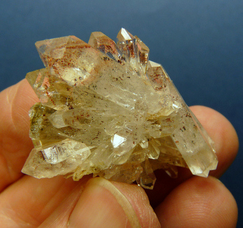 Quartz crystals with hematite inclusions, on small matrix
