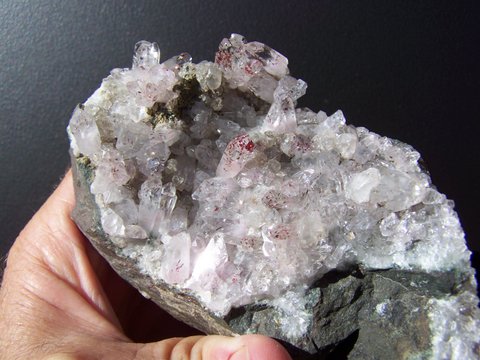 Harlequin quartz and calcite crystals on basalt matrix