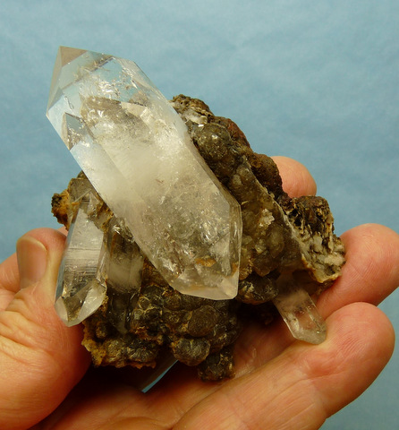 Double terminated faden quartz crystals on matrix