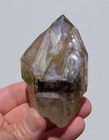 "Fenster" quartz crystal with spectacular facets in window