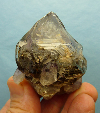 Smoky / amethyst window quartz crystal on matrix