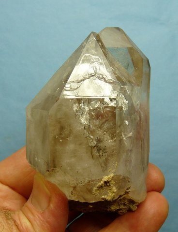 Large quartz crystal with gas inclusions and twin female terminations