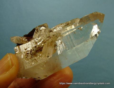 Beautiful quartz crystal with miniature crystals and goethite Beautiful quartz crystal with miniature crystals and goethite
