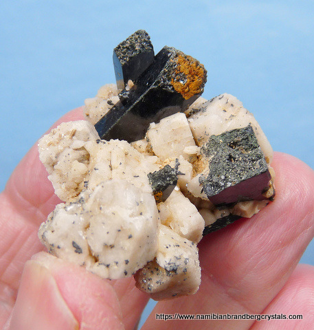 Aegerine crystals on well-formed feldspar crystals