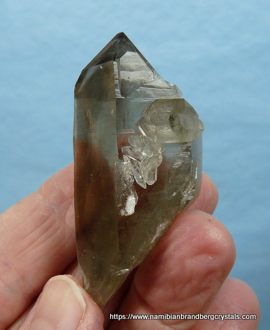 Double / multi-terminated smoky quartz crystal with chlorite inclusions