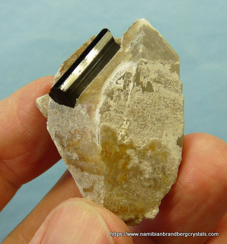 Schorl crystal on double terminated quartz crystal