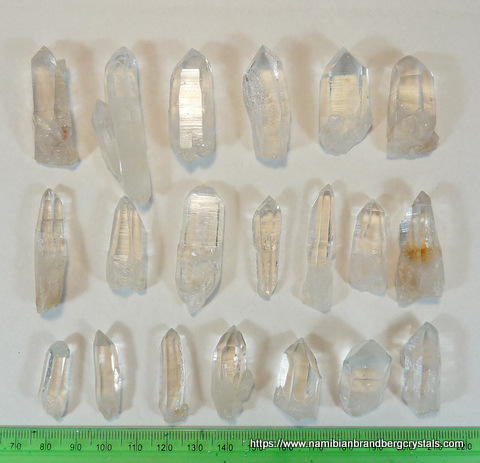 20 medium to high quality clear quartz crystals