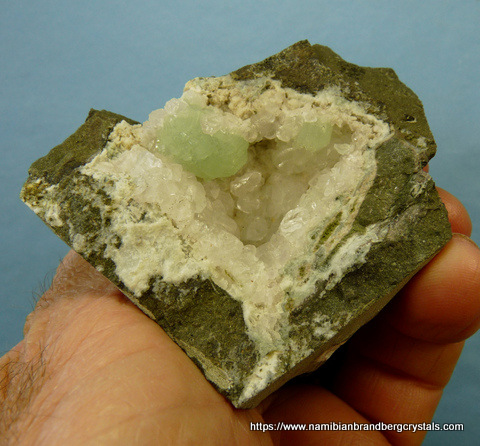 Prehnite, quartz and calcite crystals in geode