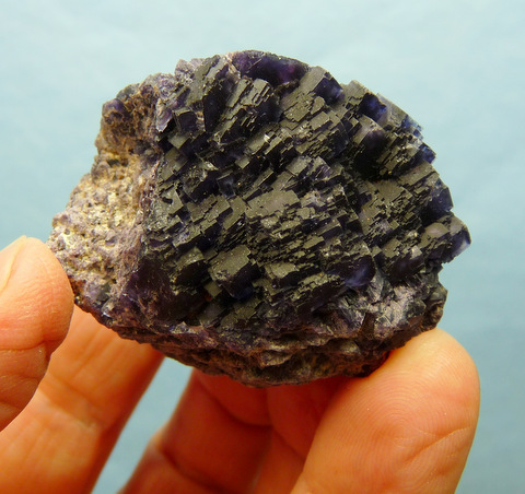 Dark purple fluorite crystal group