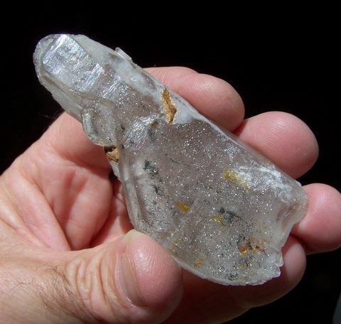 Unusual quartz crystal with sparkling hematite inclusions
