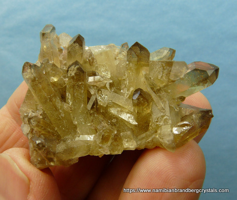 Citrine quartz crystal group with phantoms and smoky terminations