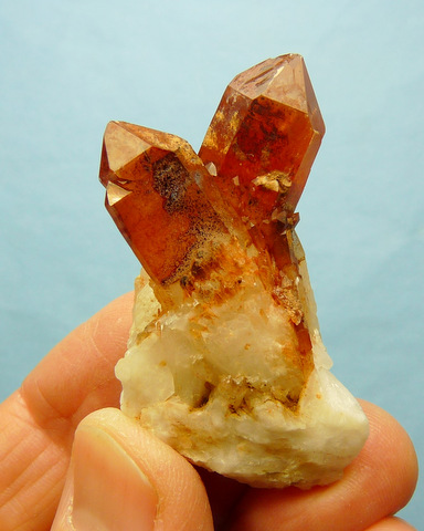 Quartz crystas with orangy-brown hematite colouring captured