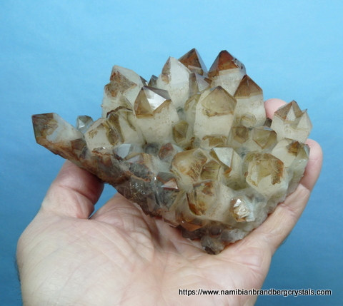 Stunning quartz crystal group with variety of colour inclusions