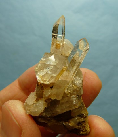 Clear quartz crystal group on matrix